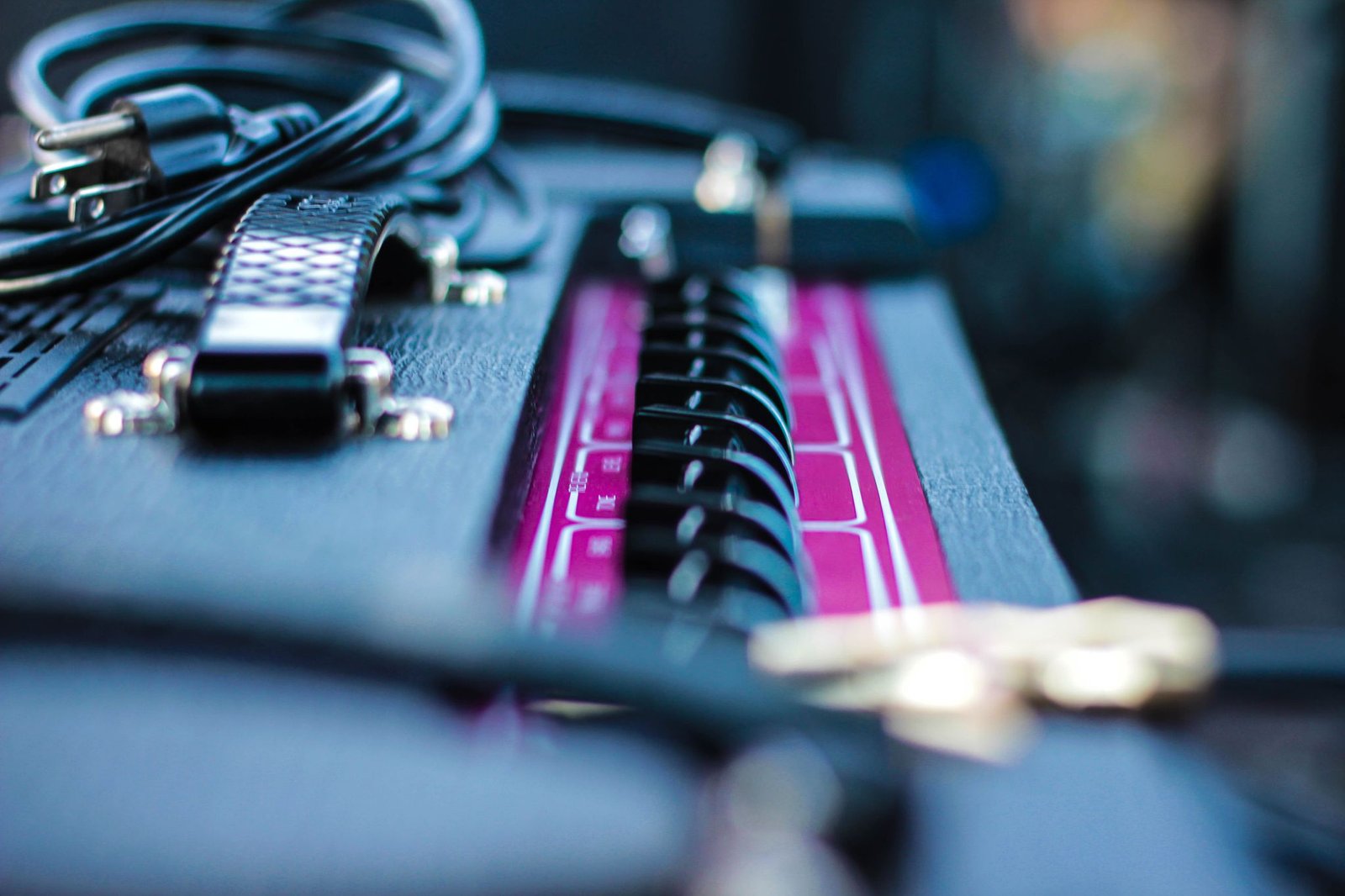 Detailed view of audio cables and equipment, showcasing technology and music connection.
