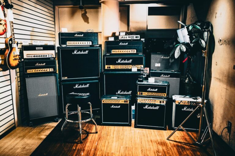 Neatly stacked Marshall amplifiers in a music studio, perfect for rock band sessions.